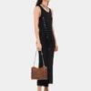 Rochie neagră fără mâneci, drapată, cu nasturi