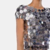 Topul iconic argintiu cu discuri Sparkle